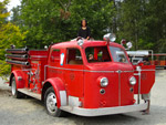 Claire playing on the old fire truck at Remlinger Farms.