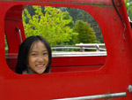 Claire driving the old fire truck at Remlinger Farms.